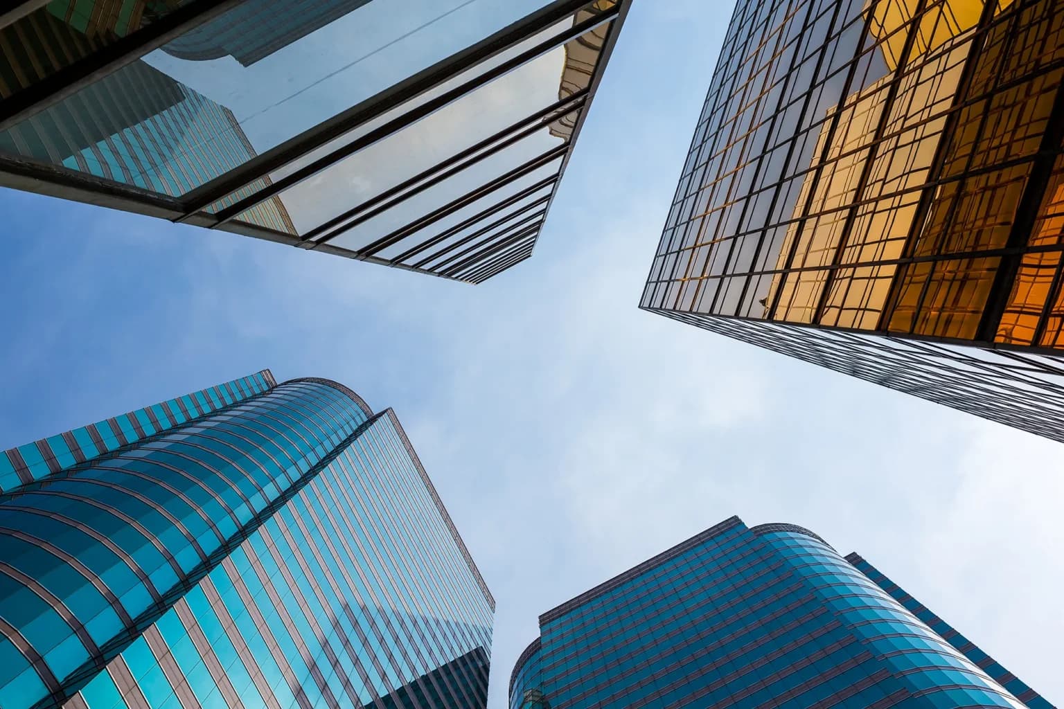 Modern glass commercial high-rises with energy-efficient façades